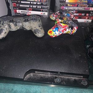 PS3 Slim with a multiple games and 4 controllers